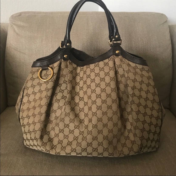 Gucci Handbags - 💯% Authentic Huge Gucci Sukey logo purse
